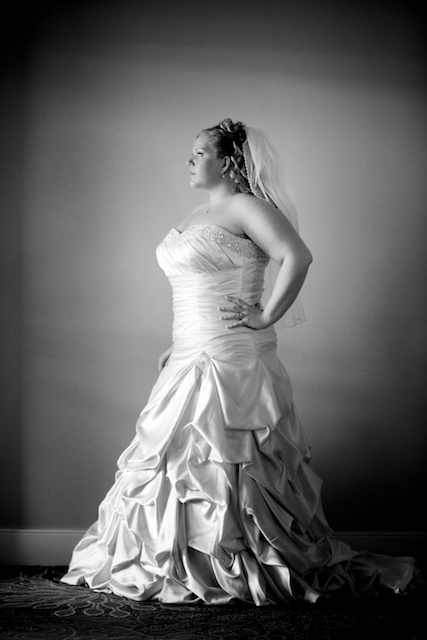 Deep shadows in the folds of the dress emphasize the texture and structure creating a very statuesque feeling.