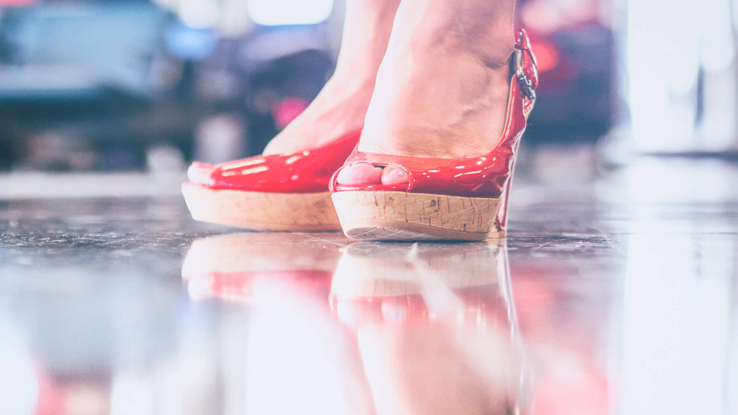 red-shoes-reflection-in-floor-featured-2