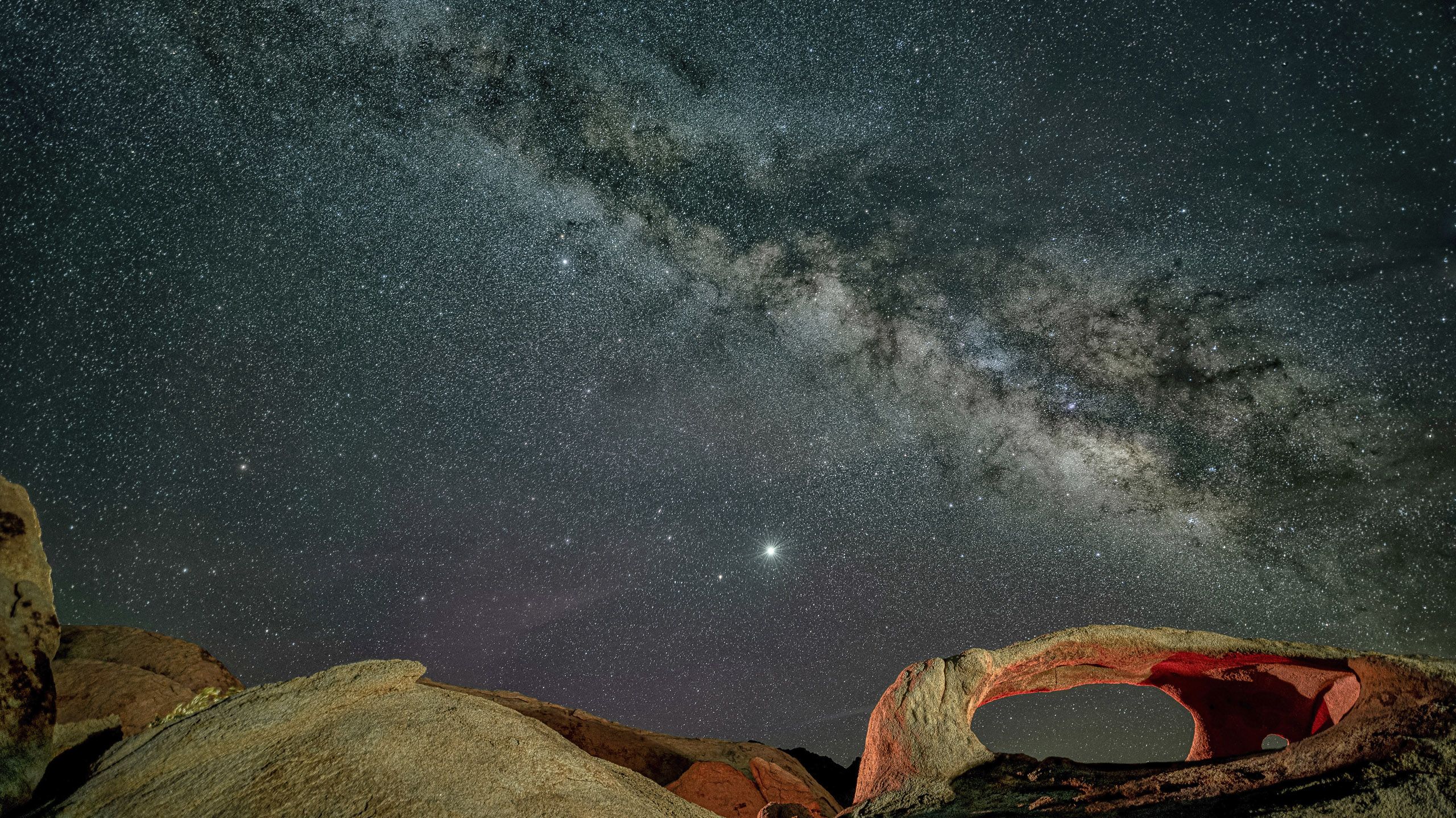 6322_kenlee_ojo-oro-arch_200517_0207_earth-135sf25iso400_sky17photosat15sf25iso4000_milkyway-landscape-low-lookingup_flat-BRIGHTERFORPRINTING-EVENMORE photofocus Header Made from 17 light frames by Starry Landscape Stacker 1.8.0. Algorithm: Min Horizon Noise