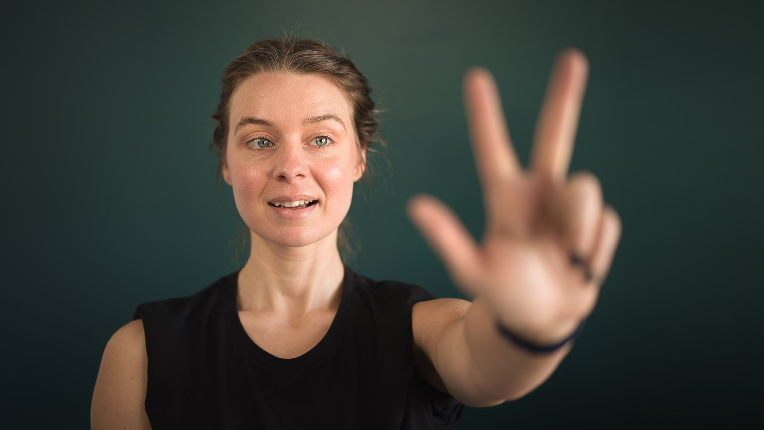 CoverArticle Woman blurred hand foreground