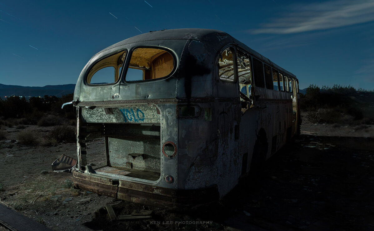 Night photo of abandoned passenger bus.