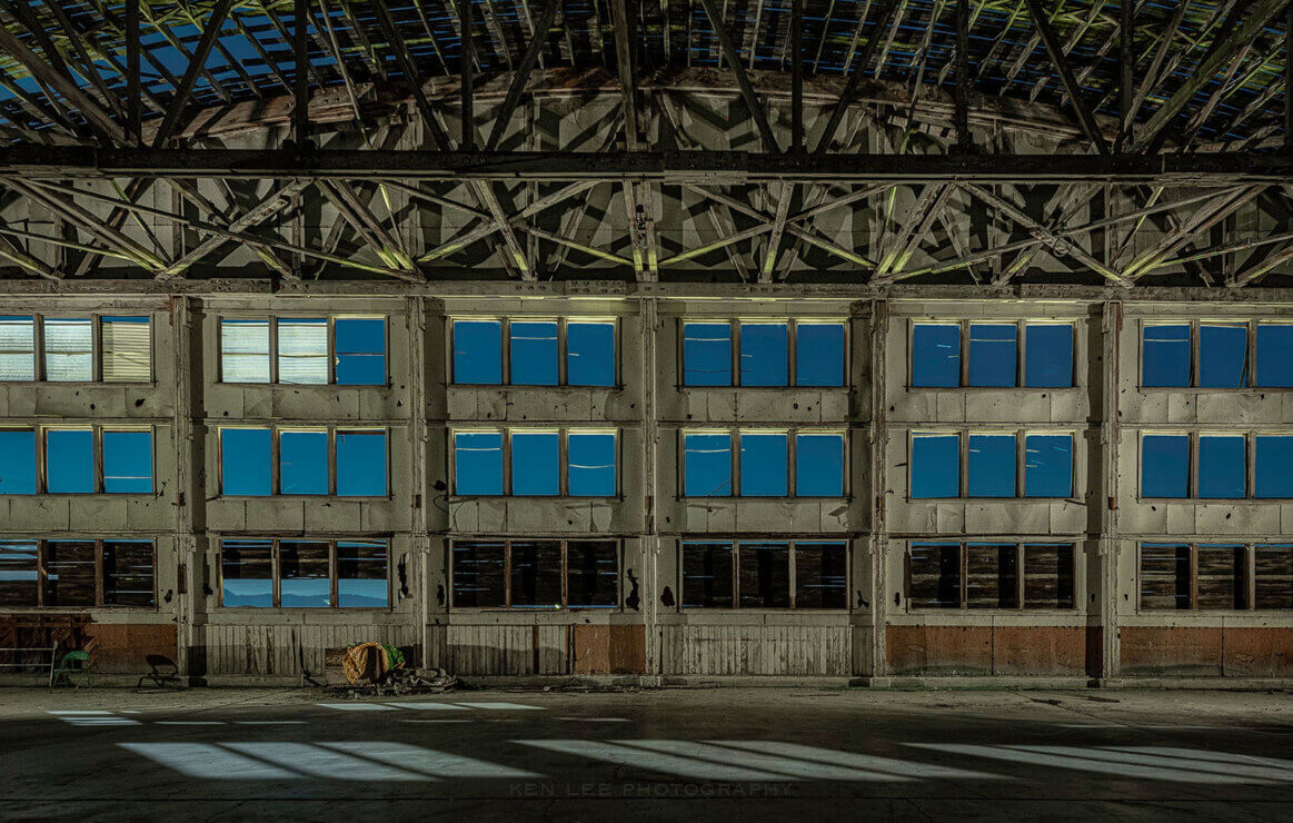 The inside of an abandoned historic wooden WWII airplane hangar.